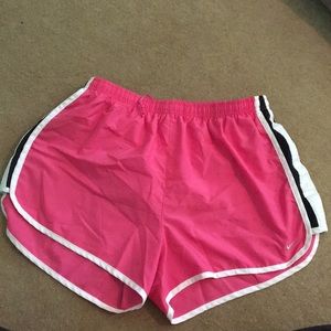Pink Nike running shorts